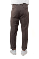 Pantalone con pince in coordinato
