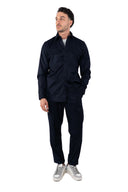 Pantalone con pince in coordinato