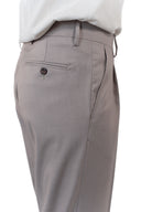 Pantalone con pince in coordinato