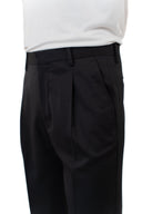 Pantalone con pince in coordinato